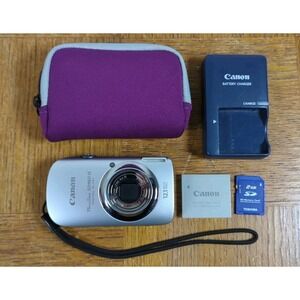 Canon PowerShot SD960 IS Digital ELPH 12.1MP Camera Bundle Silver Tested Works